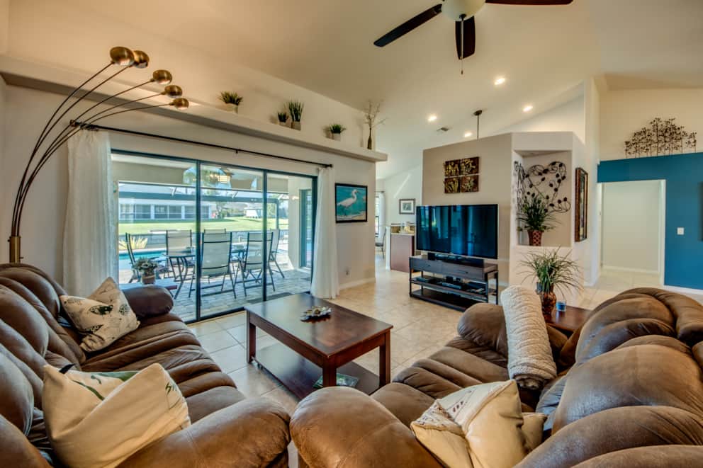 Bright living area with access to the pool terrace